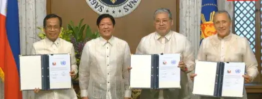 Officials from the UN and Government of the Philippines who signed the document